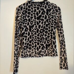 woman’s long sleeve mesh top